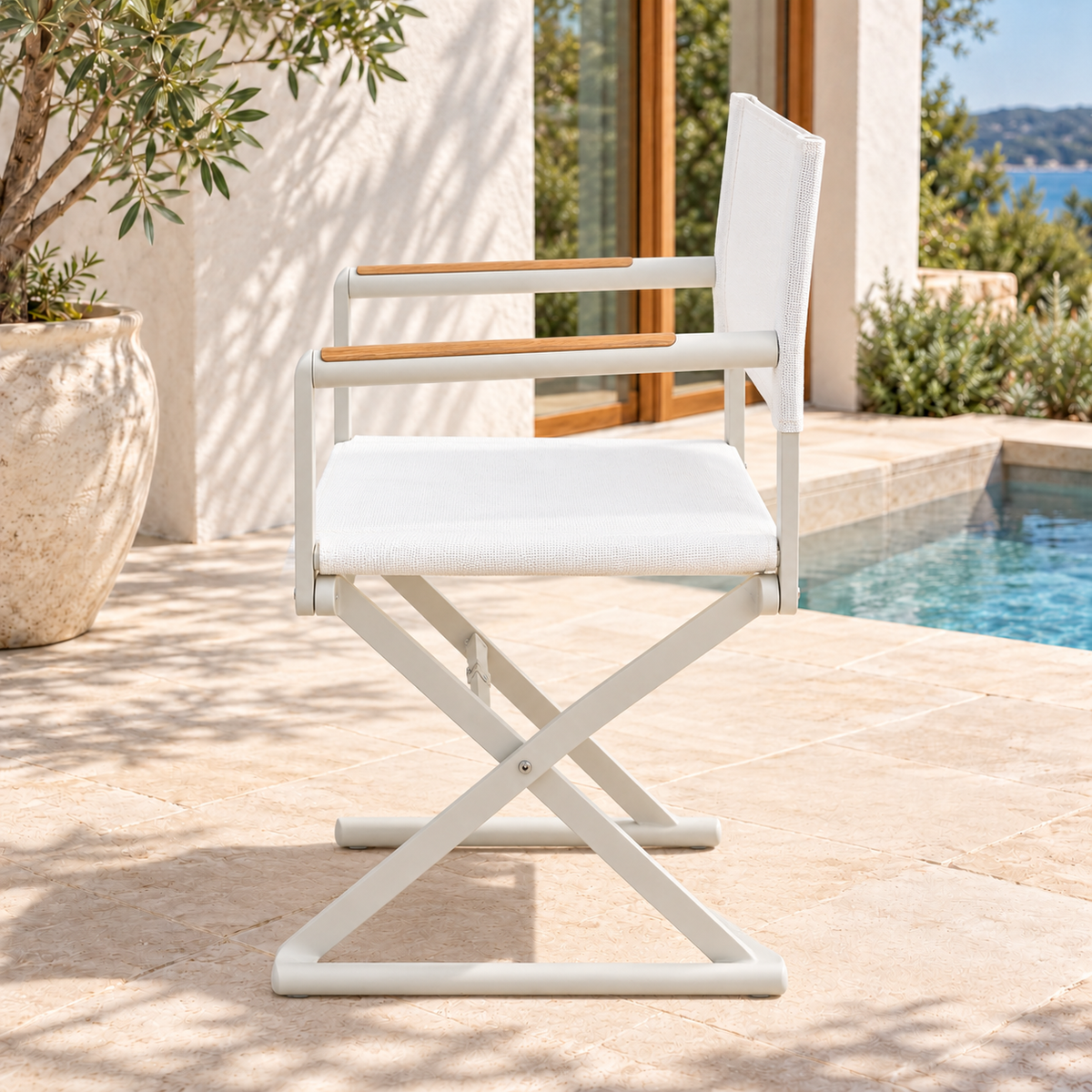 Roller folding outdoor director’s chair, side profile showing folding frame